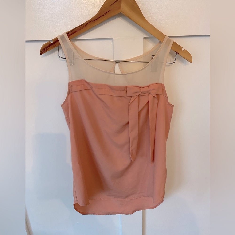 Adorable bow tank top with sheer detail